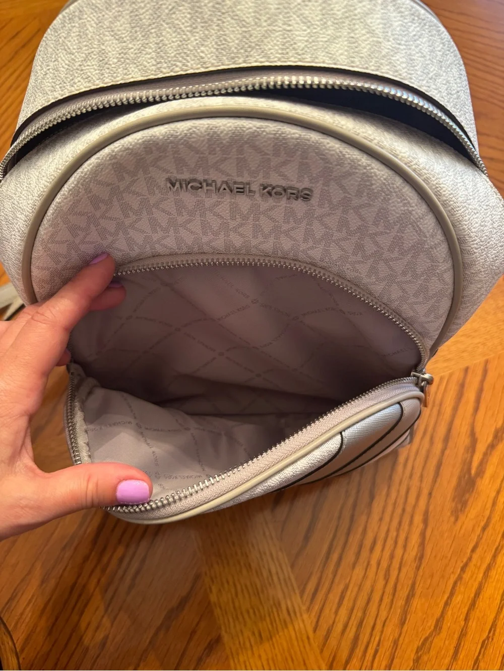 Michael Kors Chevron Accent Mini Backpack in white and gray